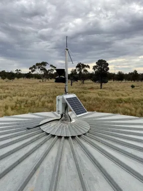 Satellite monitoring device for stock water